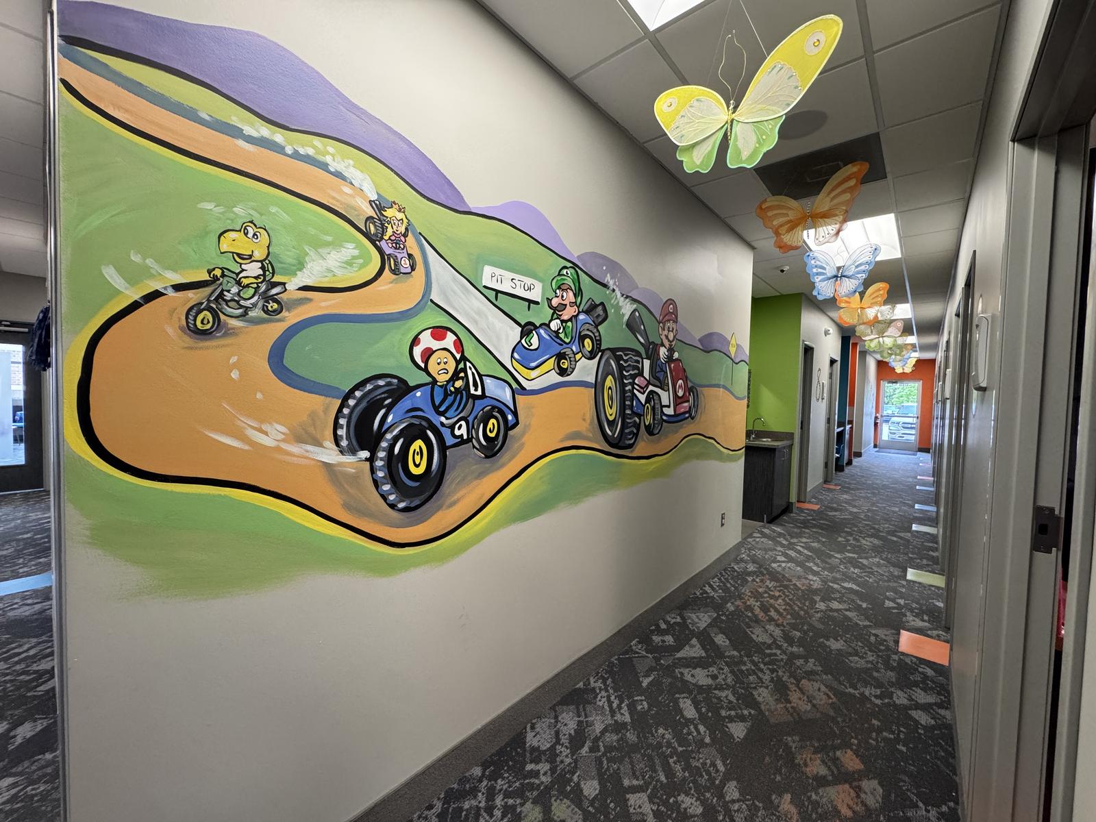 Hallway Colorful game room inside the pediatric dental office